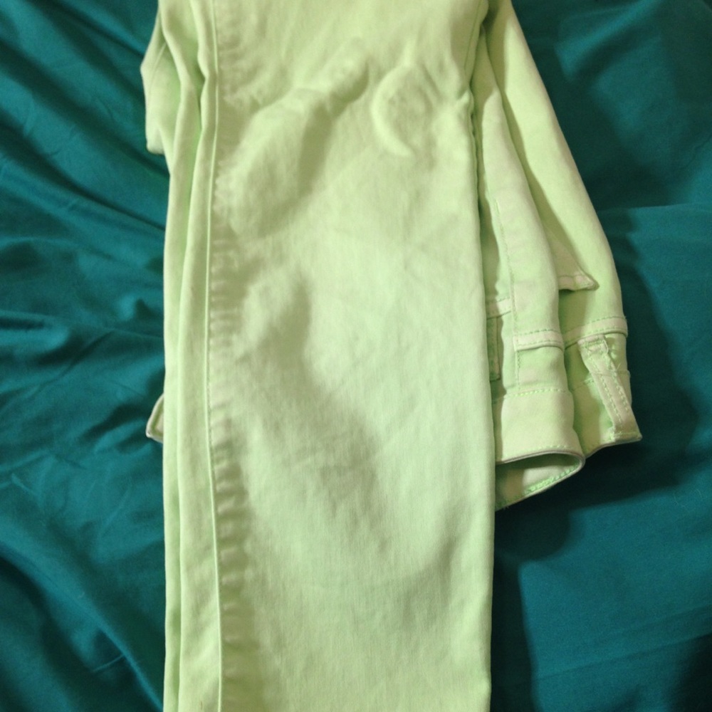 Lime green skinny jeans.